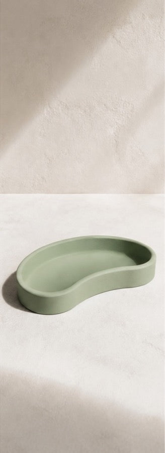 A soft green cast dish