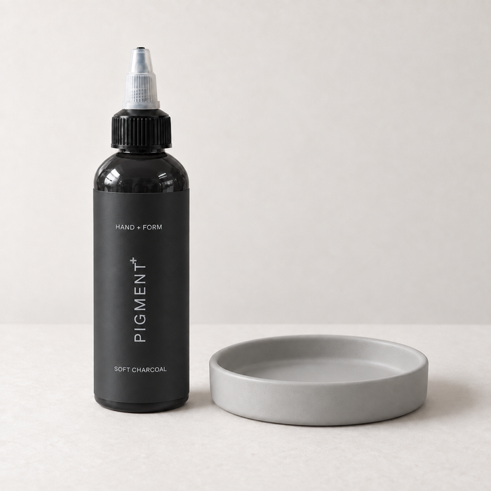 Pigment+ Soft Charcoal — bottle and pastel cast dish
