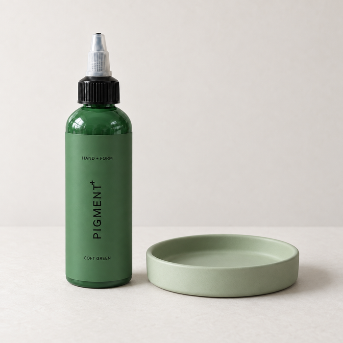 Pigment+ Soft Green — bottle and pastel cast dish