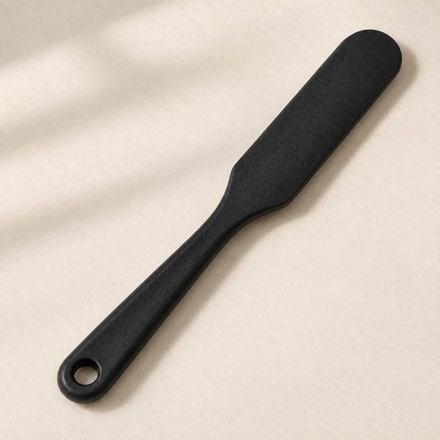 Black mixing spatula — paddle and handle detail